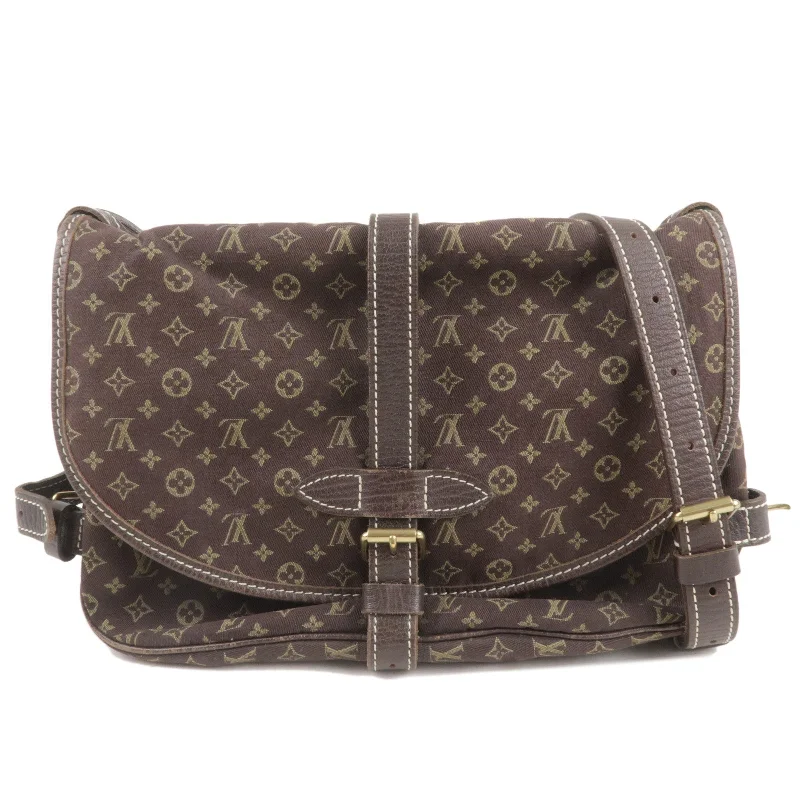 Louis Vuitton Alma bags with a monogram - embossed leather surfaceLouis Vuitton Monogram Mini Lin Saumur 30 Shoulder Bag Ebene M95227