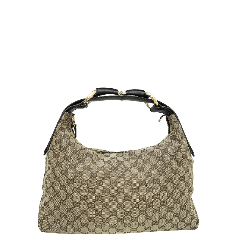 Women Gucci Sylvie bags with a monogram - embossed leatherGucci Ebony GG Horsebit Hobo Bag