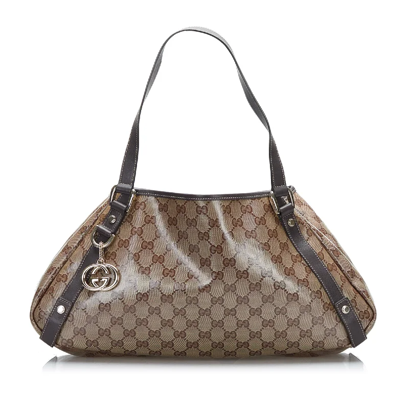 Women Gucci bags with a snap - button closure and a decorative charmGucci GG Crystal Pelham Tote Tote Bag