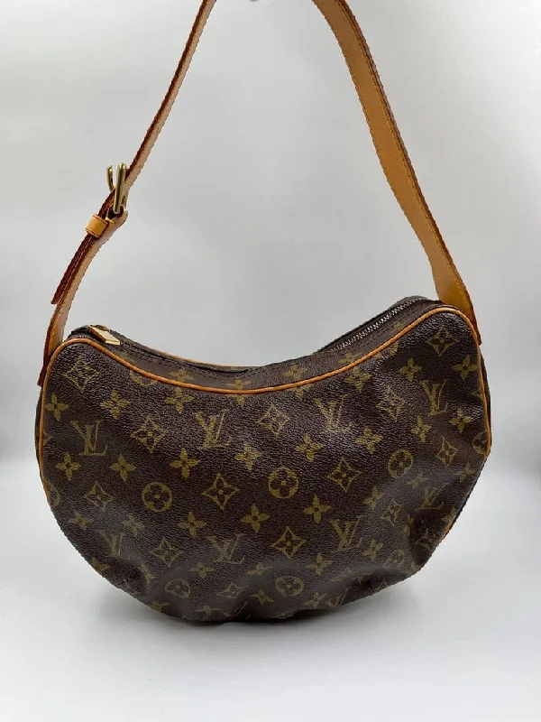 Louis Vuitton Twist bags with a contrast - colored interior for visual interestLouis Vuitton Croissant MM