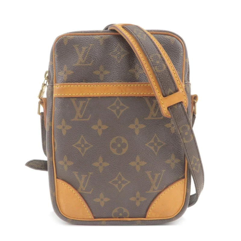 Louis Vuitton bags with a snap - button closure and a decorative charm for styleLouis Vuitton Monogram Danube Shoulder Bag M45266