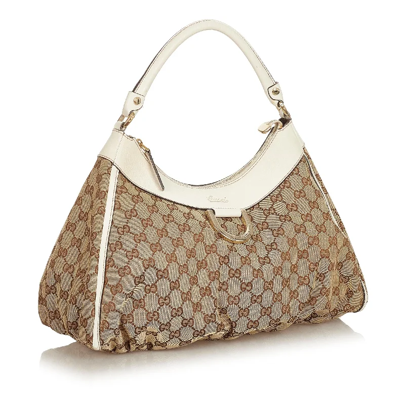 Women Gucci bags with a snap - button closure and a decorative charmGucci GG Canvas Abbey D-Ring Shoulder Bag (25134)