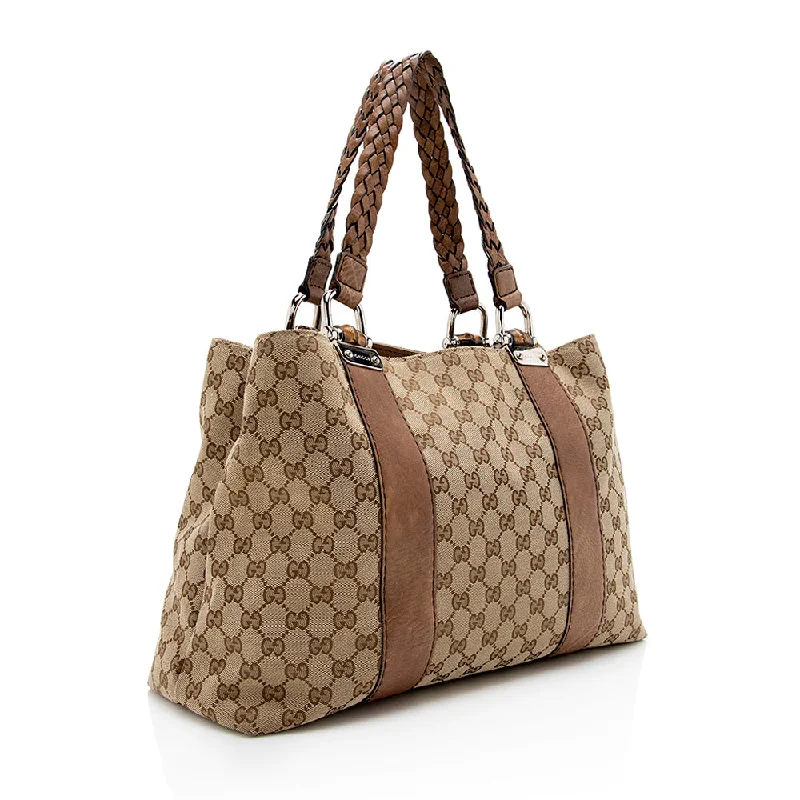 Women Gucci Sylvie bags featuring the signature web stripeGucci GG Canvas Bamboo Bar Medium Tote - FINAL SALE (17966)