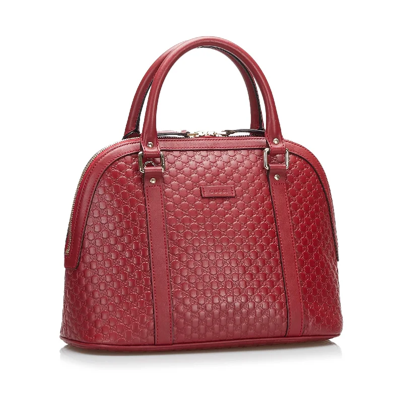 Women Gucci Sylvie bags featuring the signature web stripeGucci Microguccissima Dome (SHG-2nPdm3)