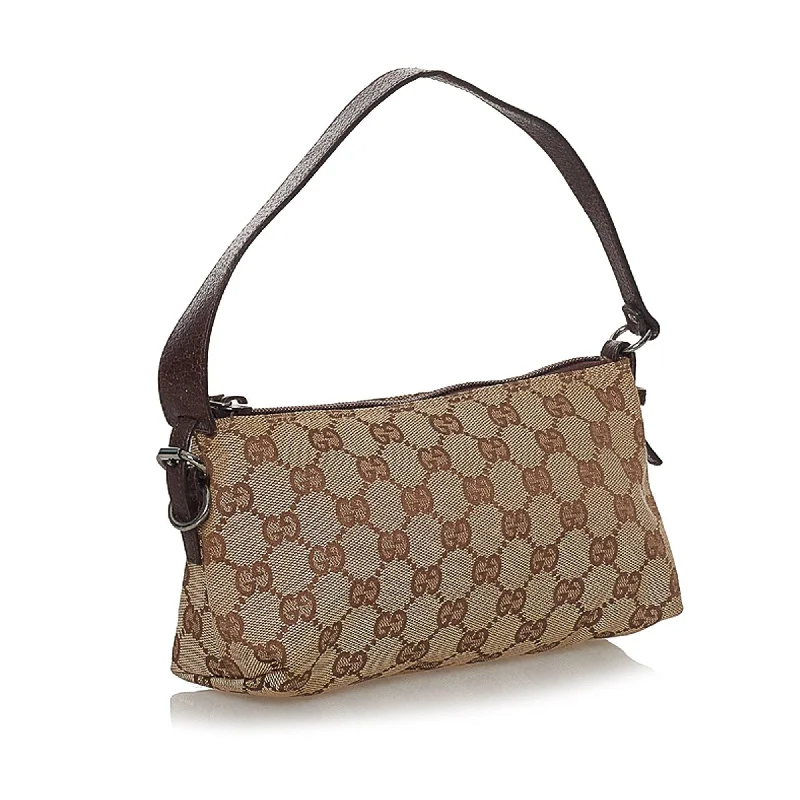 Women Gucci Sylvie bags with a monogram - embossed leatherGucci GG Canvas Baguette (33484)