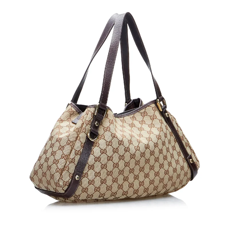 Gucci Marmont bags for women with gold - toned hardwareGucci GG Canvas Abbey D-Ring Shoulder Bag (1FtxtO)