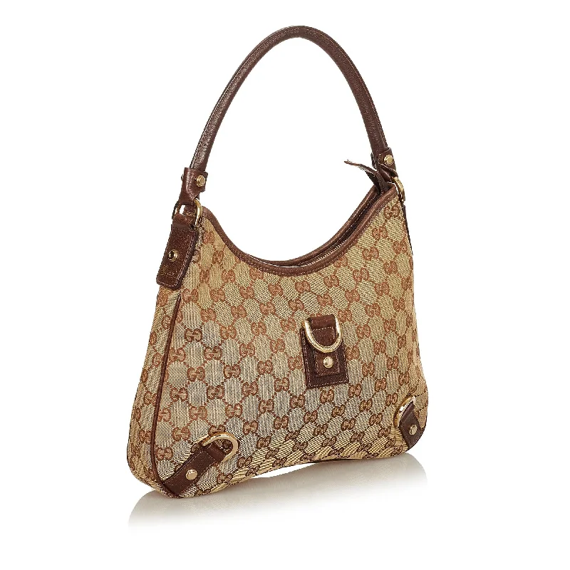 Ladies Gucci shoulder bags with a tassel decorationGucci GG Canvas Abbey D-Ring Shoulder Bag (25020)