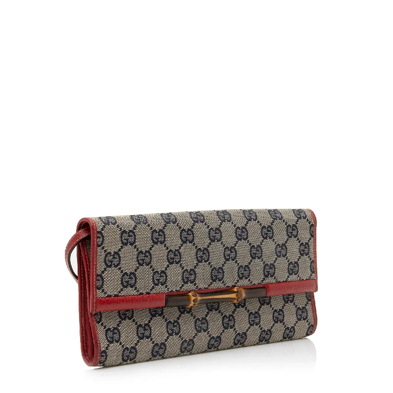 Gucci tote bags for women with a printed Gucci logoGucci GG Canvas Bamboo Bar Clutch (23324)