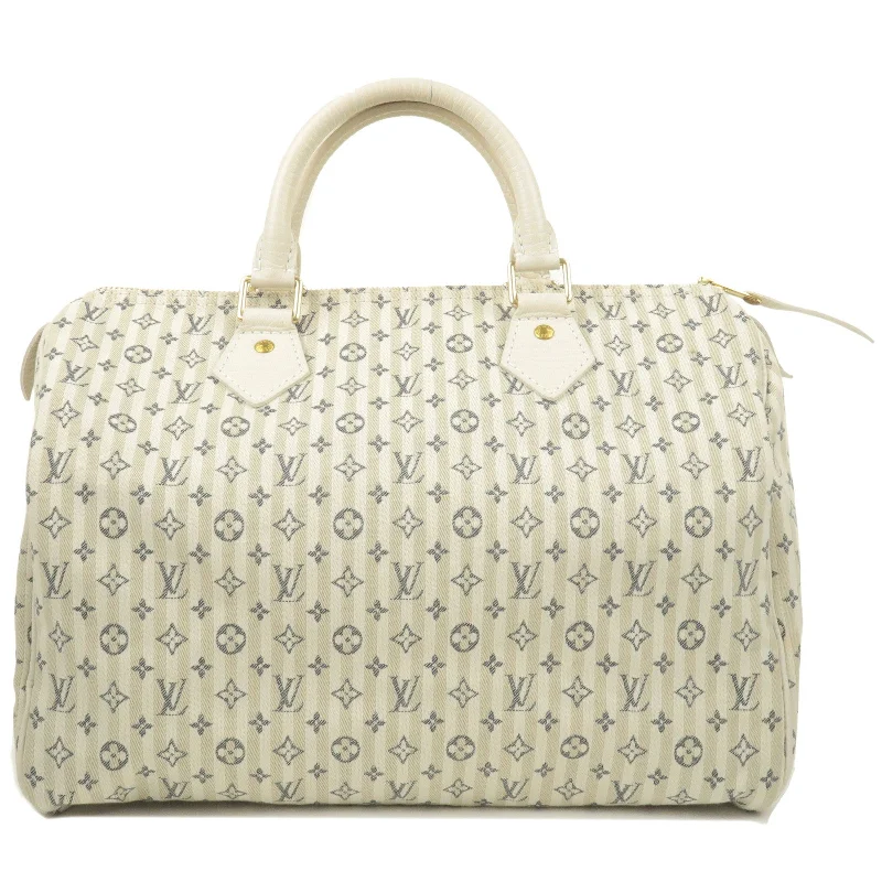 Louis Vuitton crossbody bags with a printed floral pattern for femininityLouis Vuitton Monogram Mini Lin Speedy 30 Hand Bag M95500