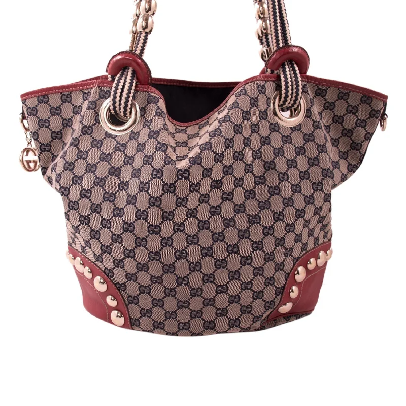 Women Gucci bags with a zippered interior pocketGucci Oversized Canvas Hobo Bag