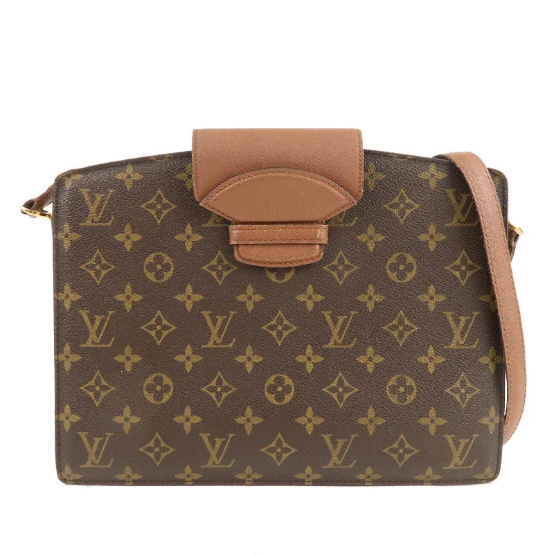 Ladies Louis Vuitton Petite Malle bags in a pastel color for a soft lookLouis Vuitton Monogram Courcelles Shoulder Bag Brown M51375