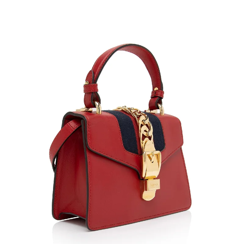 Gucci backpacks for women with a hidden back pocketGucci Leather Sylvie Mini Satchel (SHF-SJmAoq)