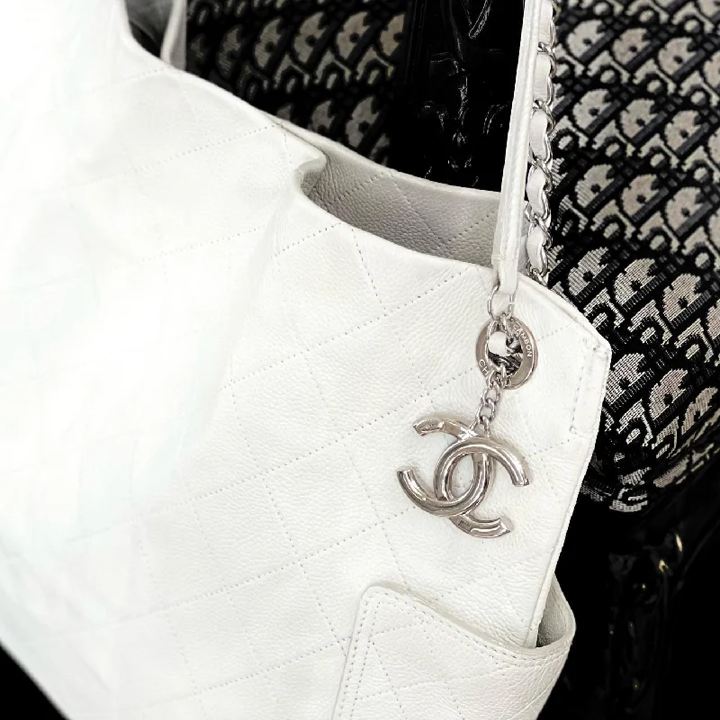 Chanel bags with exclusive seasonal releasesCHANEL CAVIAR QUILTED LEATHER TOTE BAG