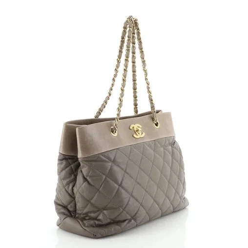 Chanel bags with classic and elegant designsCHANEL GREIGE QUILTED DISTRESSED LEATHER CHAIN TOTE BAG