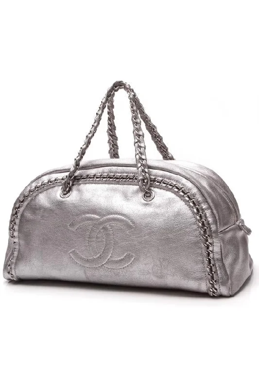 Chanel All - Match Handbag for Versatile StylingCHANEL LUXE LIGNE METALLIC SILVER LEATHER BOWLER BAG