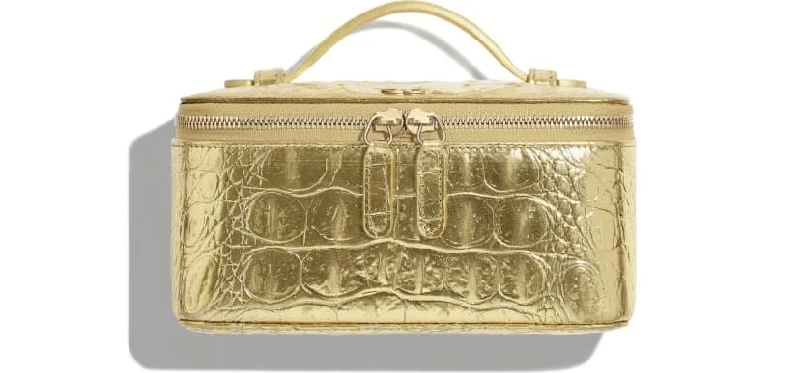 Chanel bags in luxury boutiques worldwideChanel Metallic Crocodile Embossed Calfskin & Gold Metal Classic Vanity Pouch