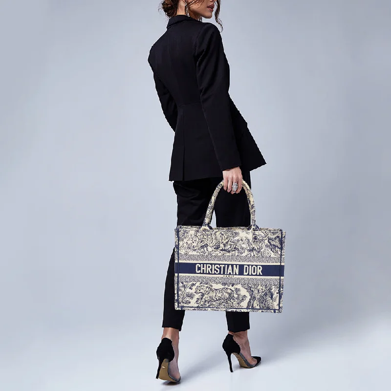 Chanel bags for a polished and professional appearanceFashion - forward Christian Dior tote bags for the modern womanDIOR Navy Blue/White Toile De Jouy Embroidery Canvas Medium Book Tote