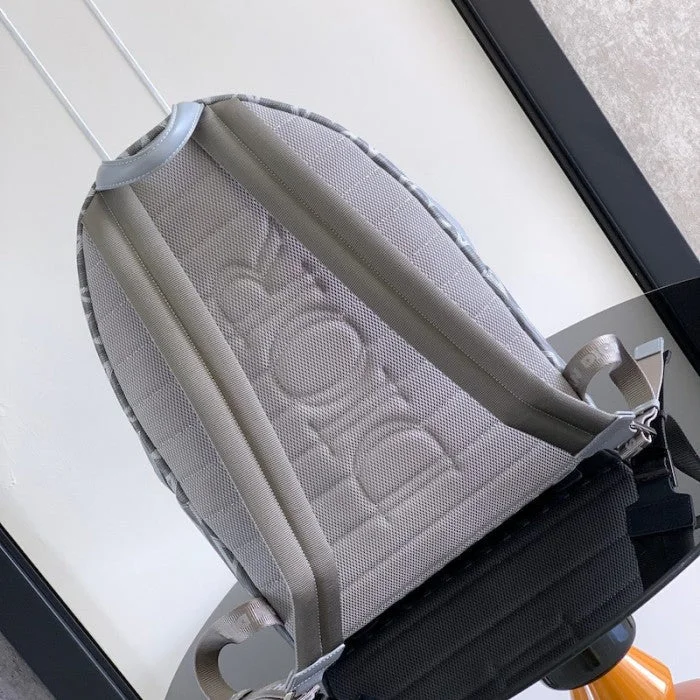 Chanel bags available at online luxury retaileChristian Dior bags with a zip - top closure and multiple compartmentsDior Rider Backpack Dior Gray CD Diamond Canvas and Smooth Calfskin