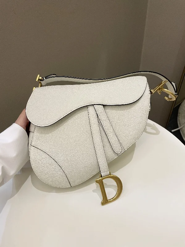 Chanel bags for women with a taste for high fashionTrendsetting Christian Dior crossbody bags with a colorful strapDior Saddle Bag Cream White